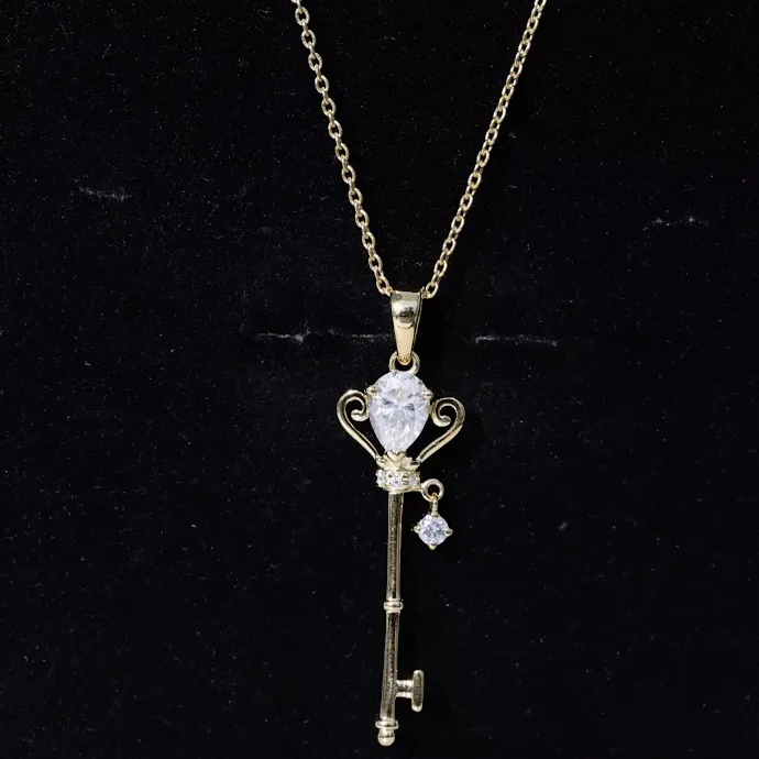 0.75 CT Elegant Moissanite Key Pendant in Prong Setting