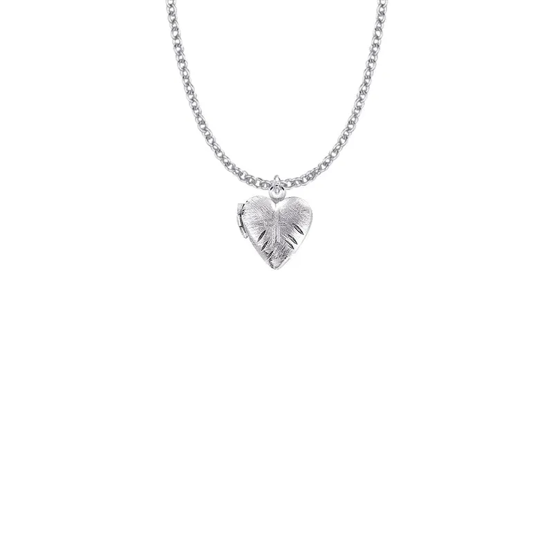 5/8 Inch Silver Plated Heart Locket and Engraved Cross Necklace