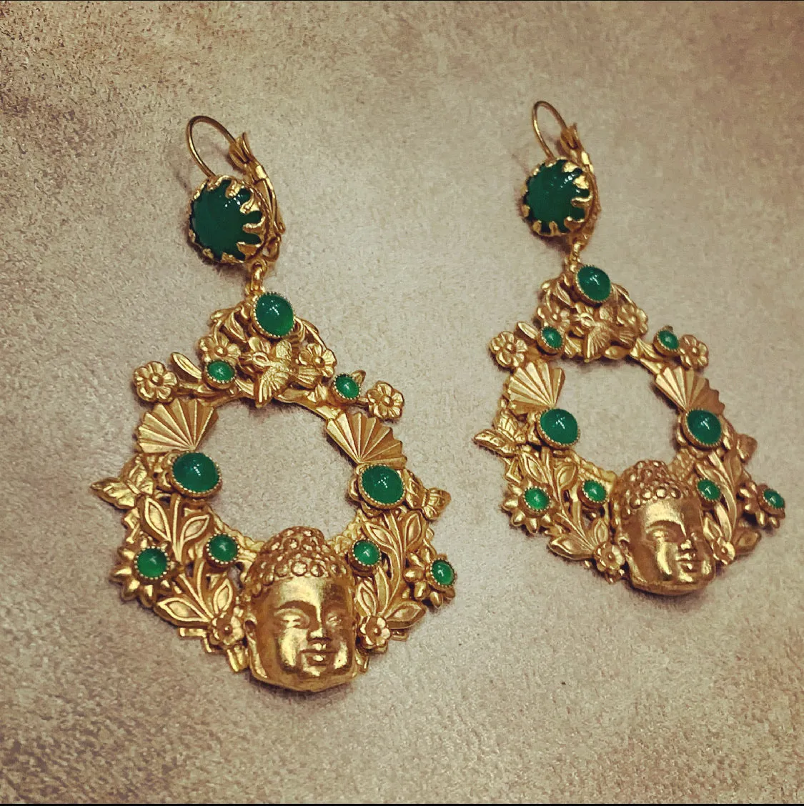 Askew London Buddha head bird statement earrings