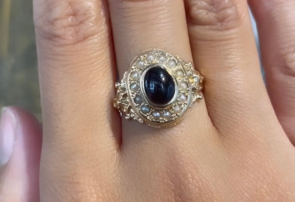 Cabochon garnet and pearl ring in 14 carat gold