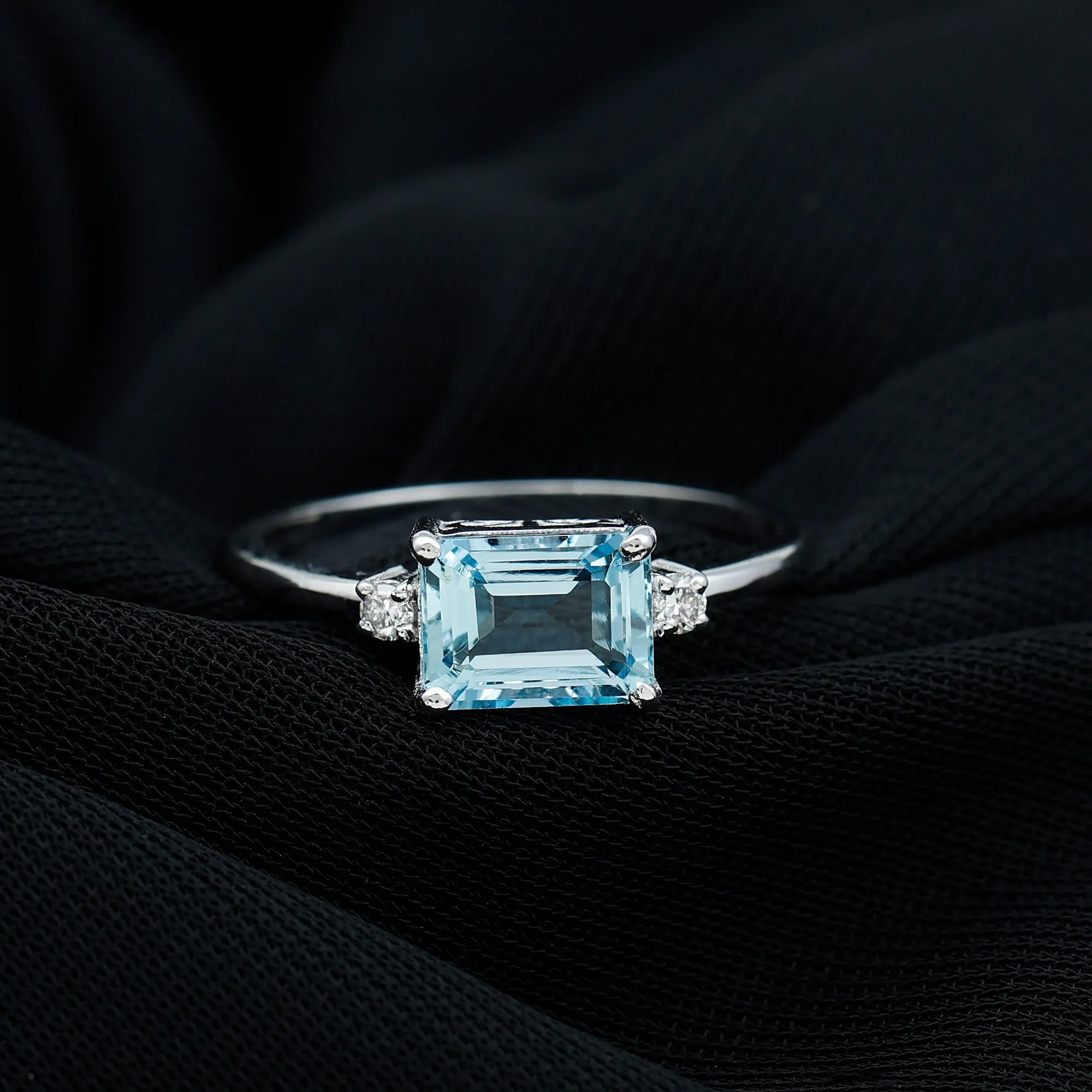 Emerald Cut Aquamarine Solitaire Engagement Ring in East West Style with Diamond