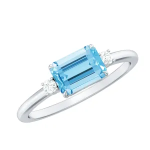 Emerald Cut Aquamarine Solitaire Engagement Ring in East West Style with Diamond