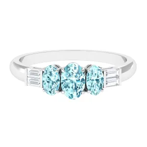 Oval Cut Aquamarine Three Stone Ring with Diamond