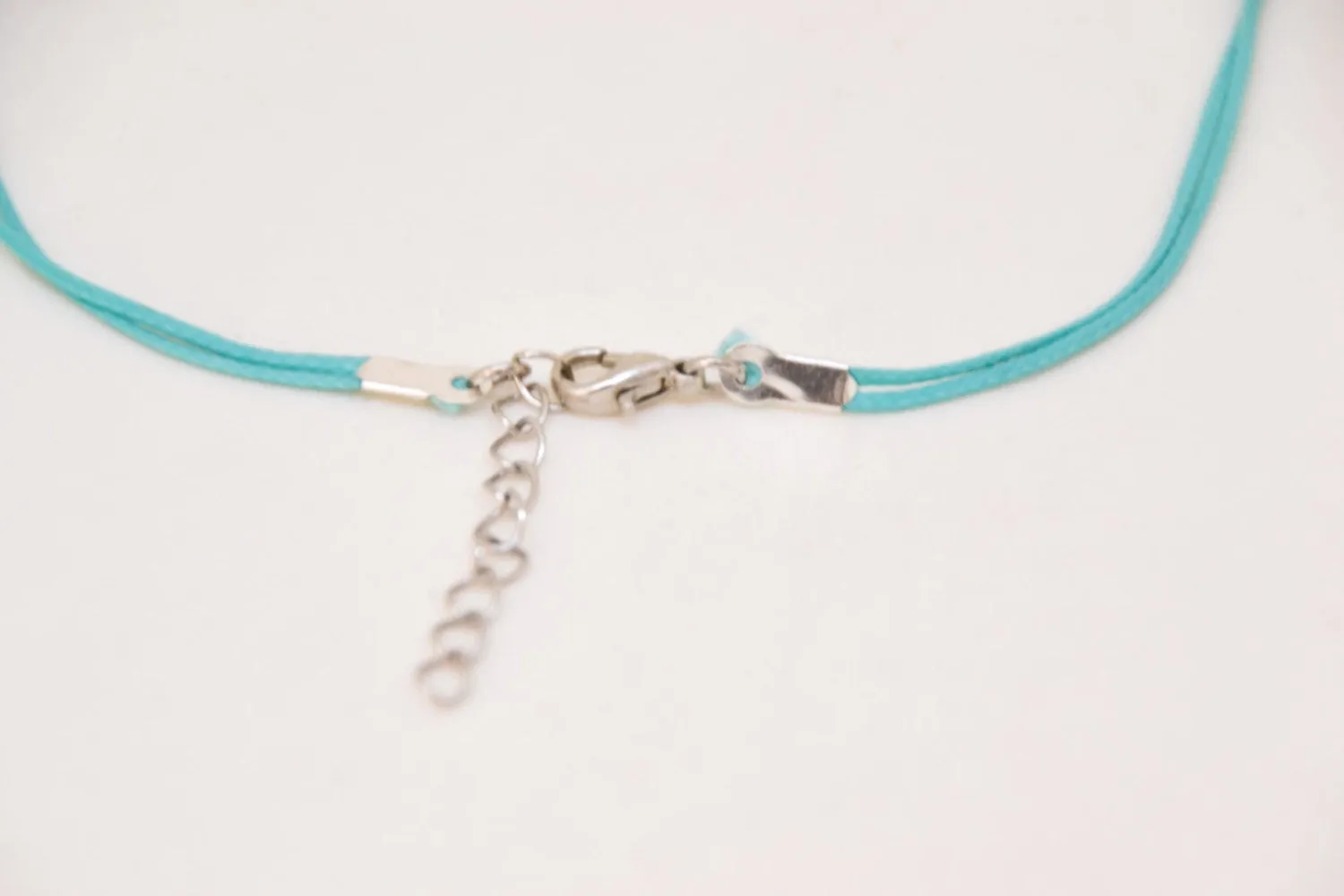 Silver beads bracelet, turquoise cord