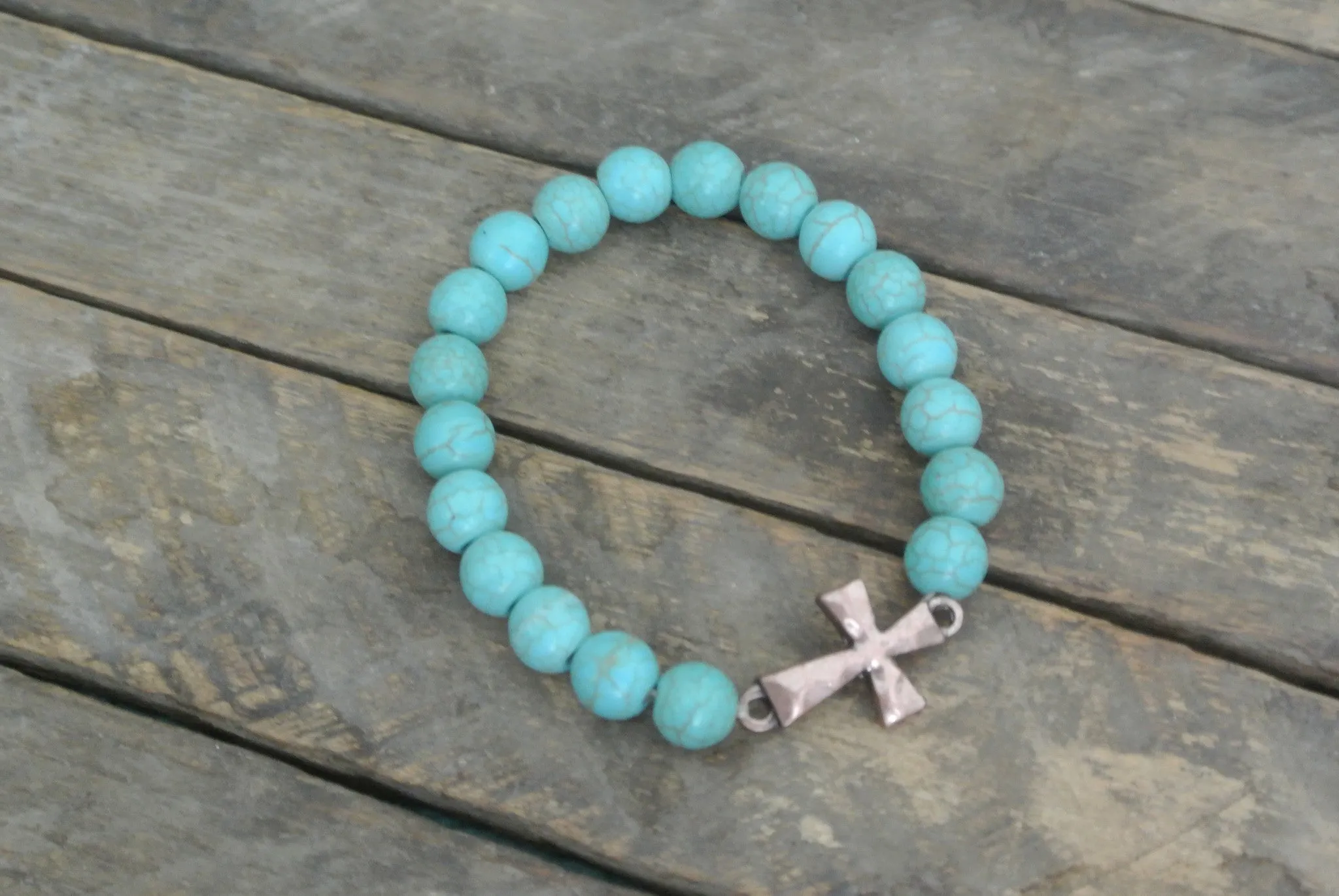 Turquoise beaded bracelet with Copper toned Hammered Cross Charm